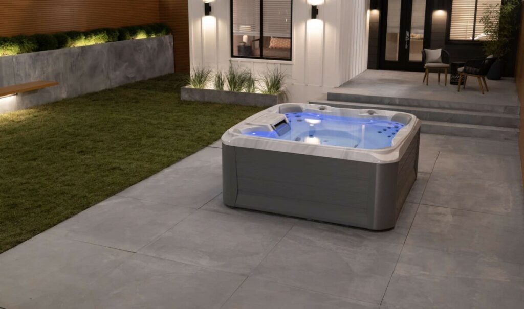 Sundance Spas 680 Edison Porcelain Slate Lifestyle Night - Atlanta Hot Tub Center